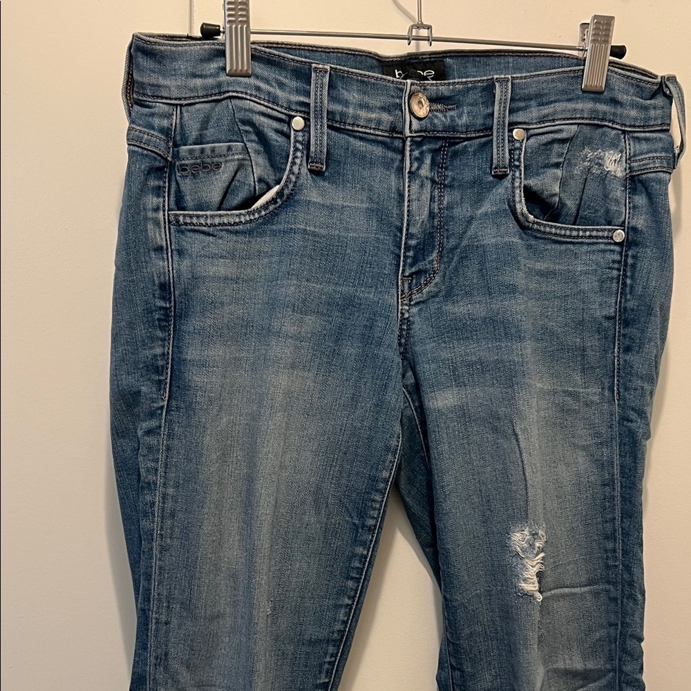 bebe Blue Straight Leg Jeans with Distressed Detail